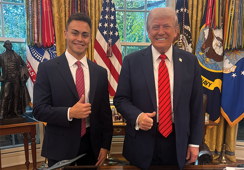 Michael Alfonso and President Donald Trump give thumbs-up gestures in the Oval Office