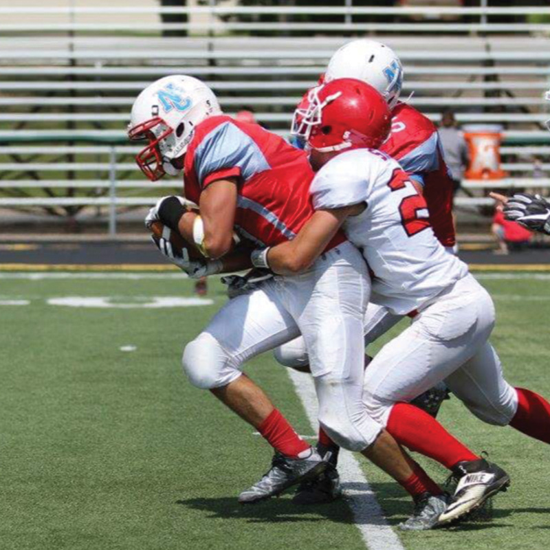 Michael Alfonso playing football
